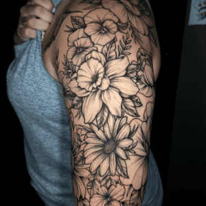 brooke dickens tattoo stenciled flowers on left arm