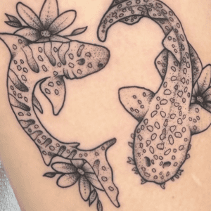A tatto on the leg showing the water creature